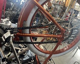 To complicate things, a different pitch chain had to be located and connected from the tranny to the rear wheel sprocket.